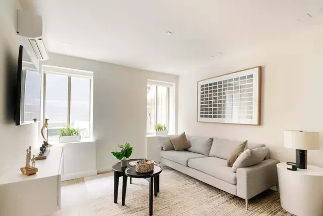 Living area — Luxurious 1BR w/ Private Patio near Central Park — The Sixty Two NYC, Lenox Hill, Upper East Side